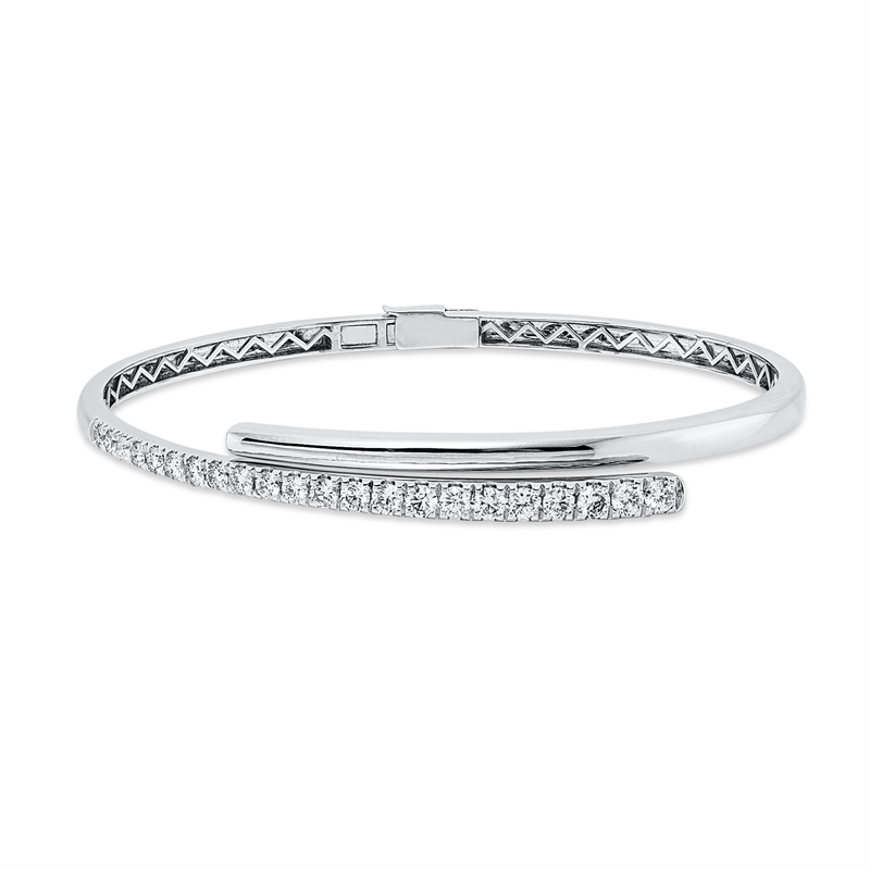 Image 90007470 - Armreif 14 kt WG, 7 Brillanten 0,32 ct, TW-pi, 10 Brillanten 0,60 ct, TW-pi, 3 Brillanten ...