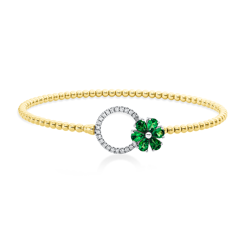 Image Armreif 18 kt GG WG, 22 Brillanten 0,17 ct, F-vsi, 6 Tsavorith 0,93 ct grün, H:47,0 mm, ...