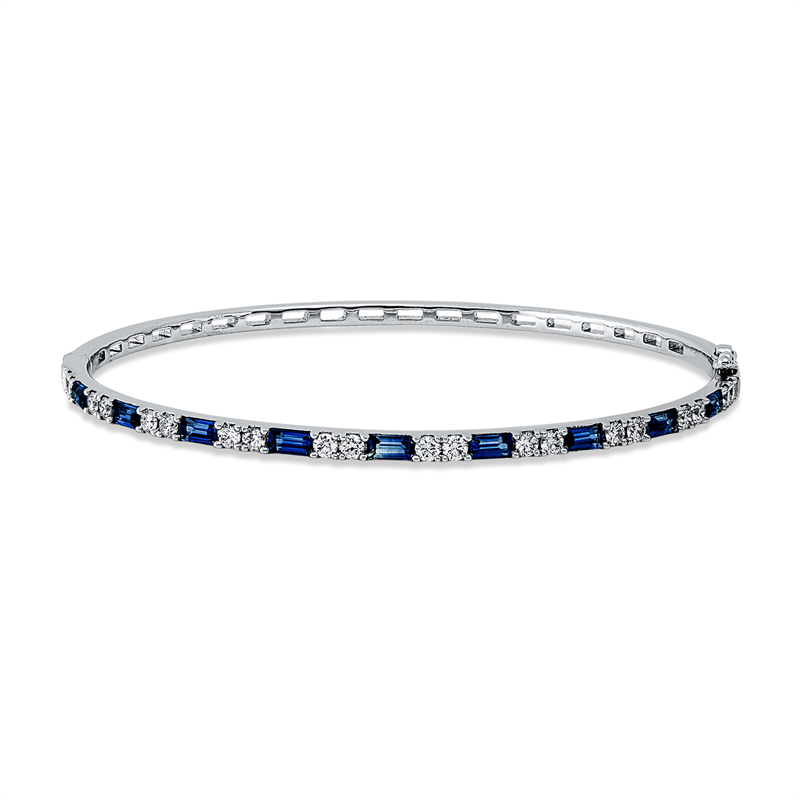 Image Armreif 14 kt WG, 20 Brillanten 0,80 ct, W-pi, 9 Saphire 1,53 ct blau, H:54,0 mm, B:61,0 ...