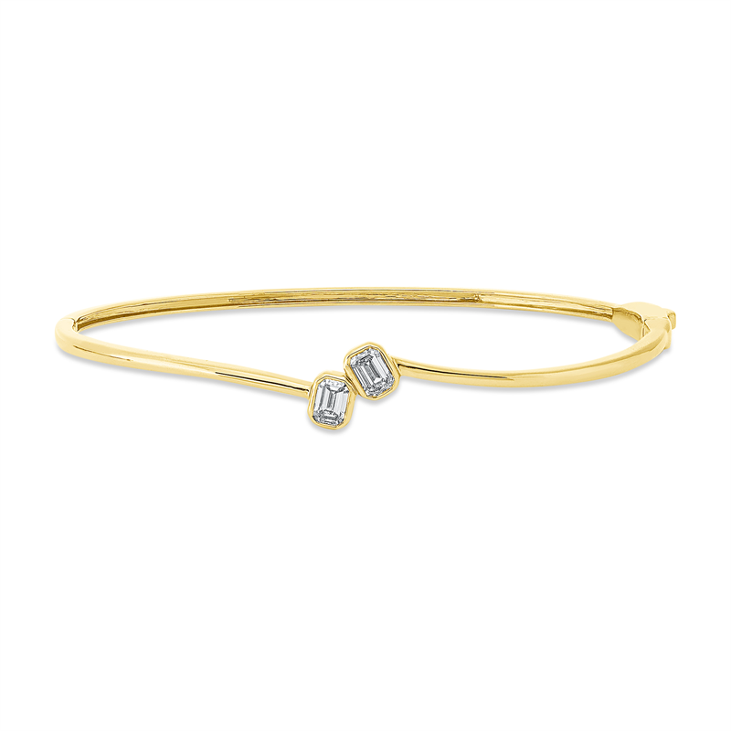 Image Armreif Zarge 18 kt GG, 2 Sm.schliff 0,54 ct, TW-si, H:50,0 mm, B:60,0 mm, S:9,0 mm