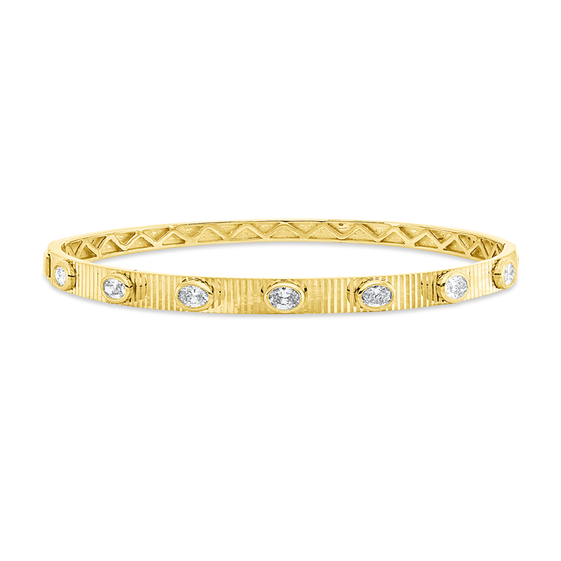 Image Armreif 18 kt GG, 7 Oval 0,73 ct, TW-si, H:47,0 mm, B:56,0 mm, S:4,1 mm