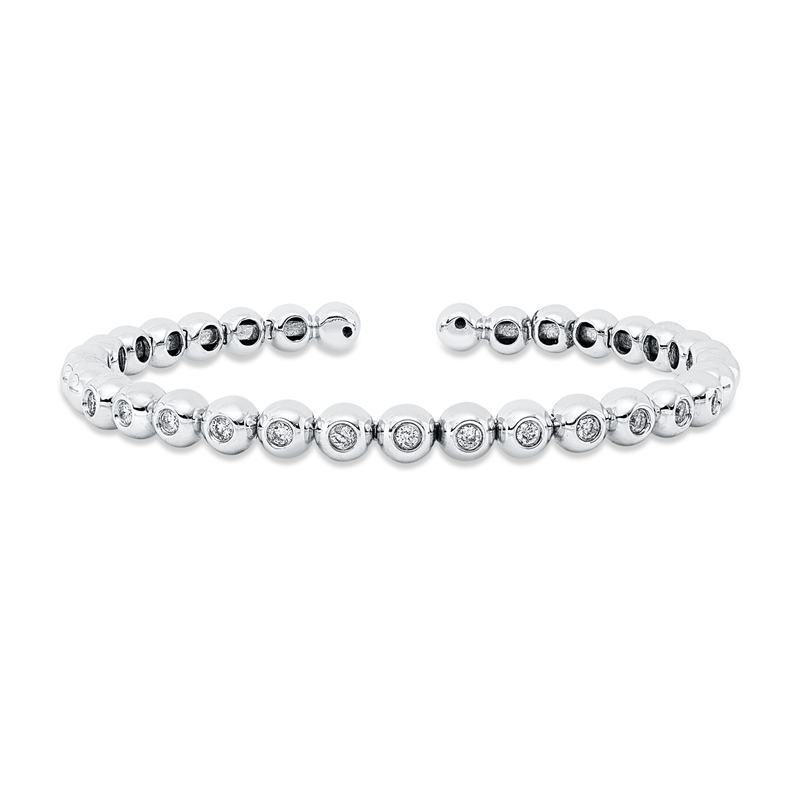 Image Armreif 18 kt WG, 13 Brillanten 0,60 ct, TW-si, H:50,0 mm, B:62,0 mm, S:5,9 mm
